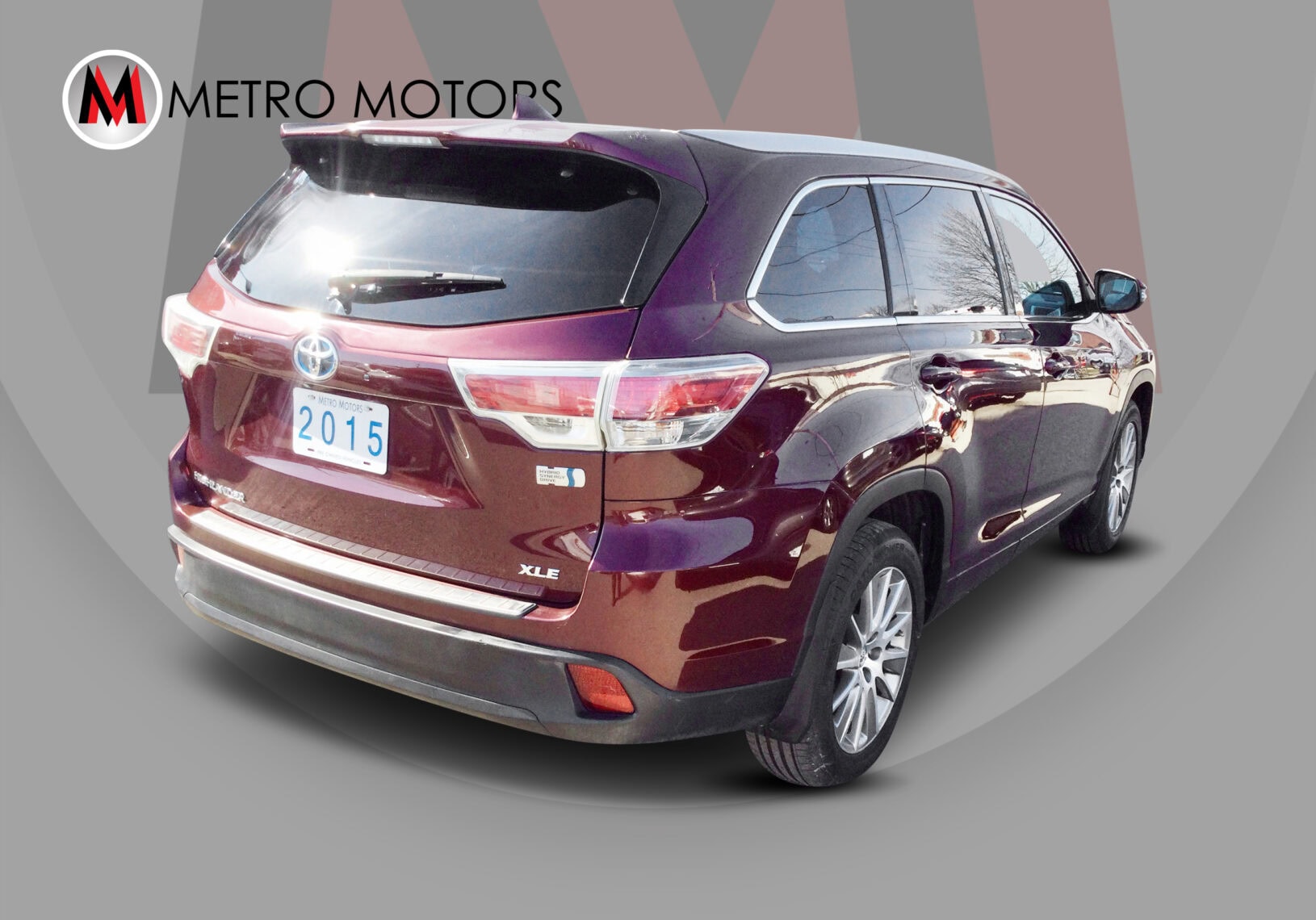 Toyota Highlander XLE hybrid SUV with 8 seats and roof rack.