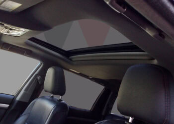 High-quality image of the 2015 Toyota Highlander XLE interior showcasing leather seats and panoramic.