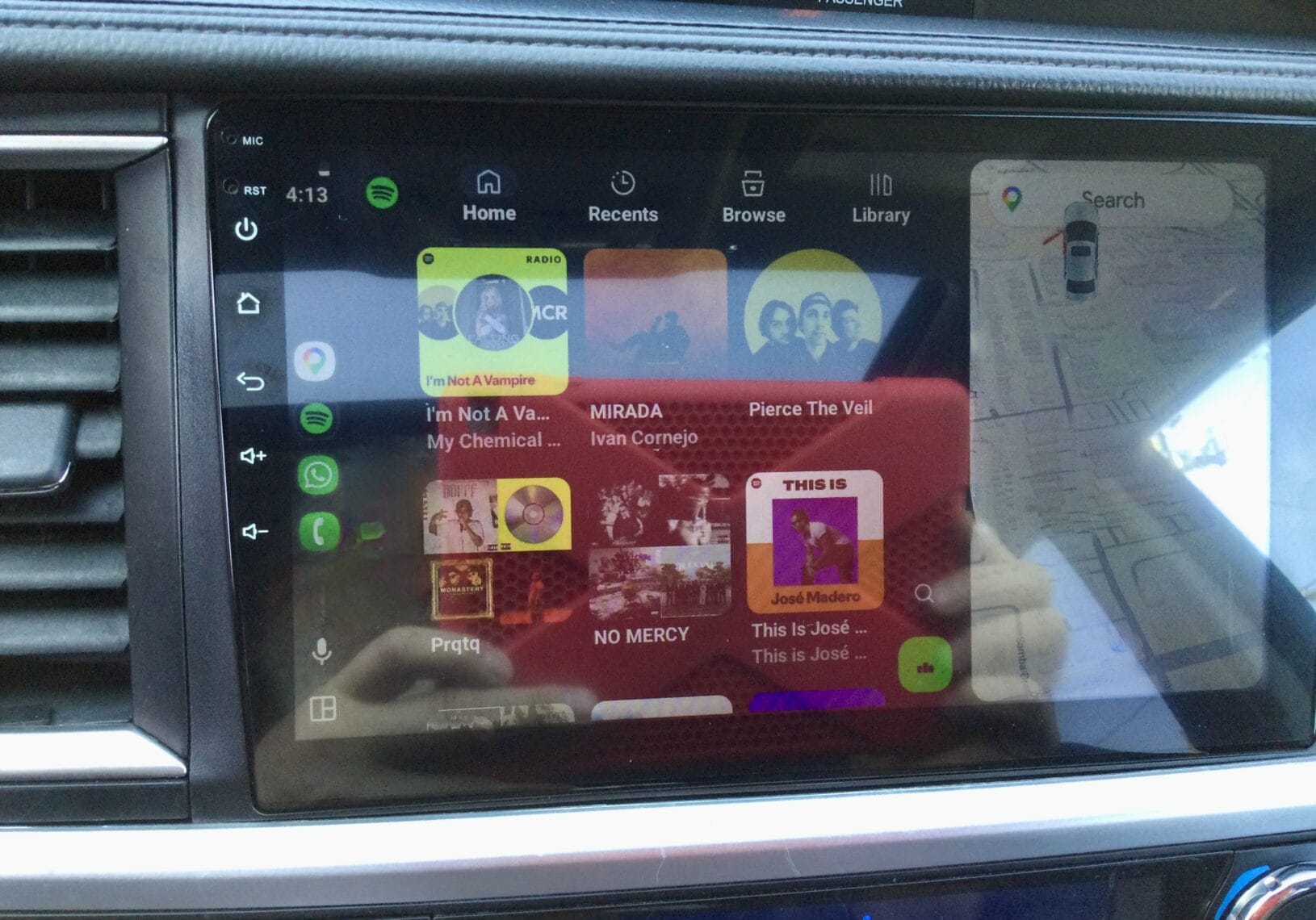 High-resolution image of a 2015 Toyota Highlander XLE Hybrid's interior touchscreen display.