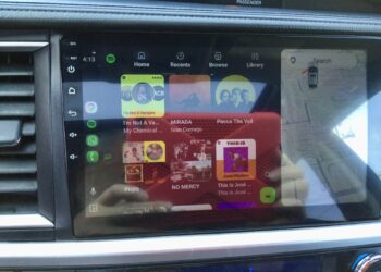 High-resolution image of a 2015 Toyota Highlander XLE Hybrid's interior touchscreen display.