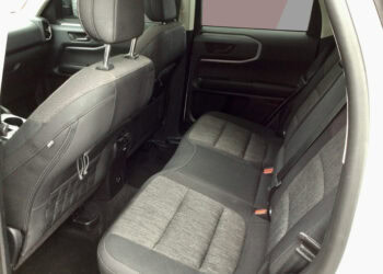 Spacious rear seats of the 2022 Ford Bronco Sport Big Bend with heated seats and large infotainment.