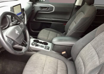 Interior view of the 2022 Ford Bronco Sport with heated seats and large infotainment screen.