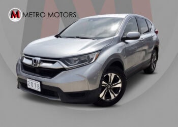 2018 Honda CR-V LX with alloy wheels and rear camera.
