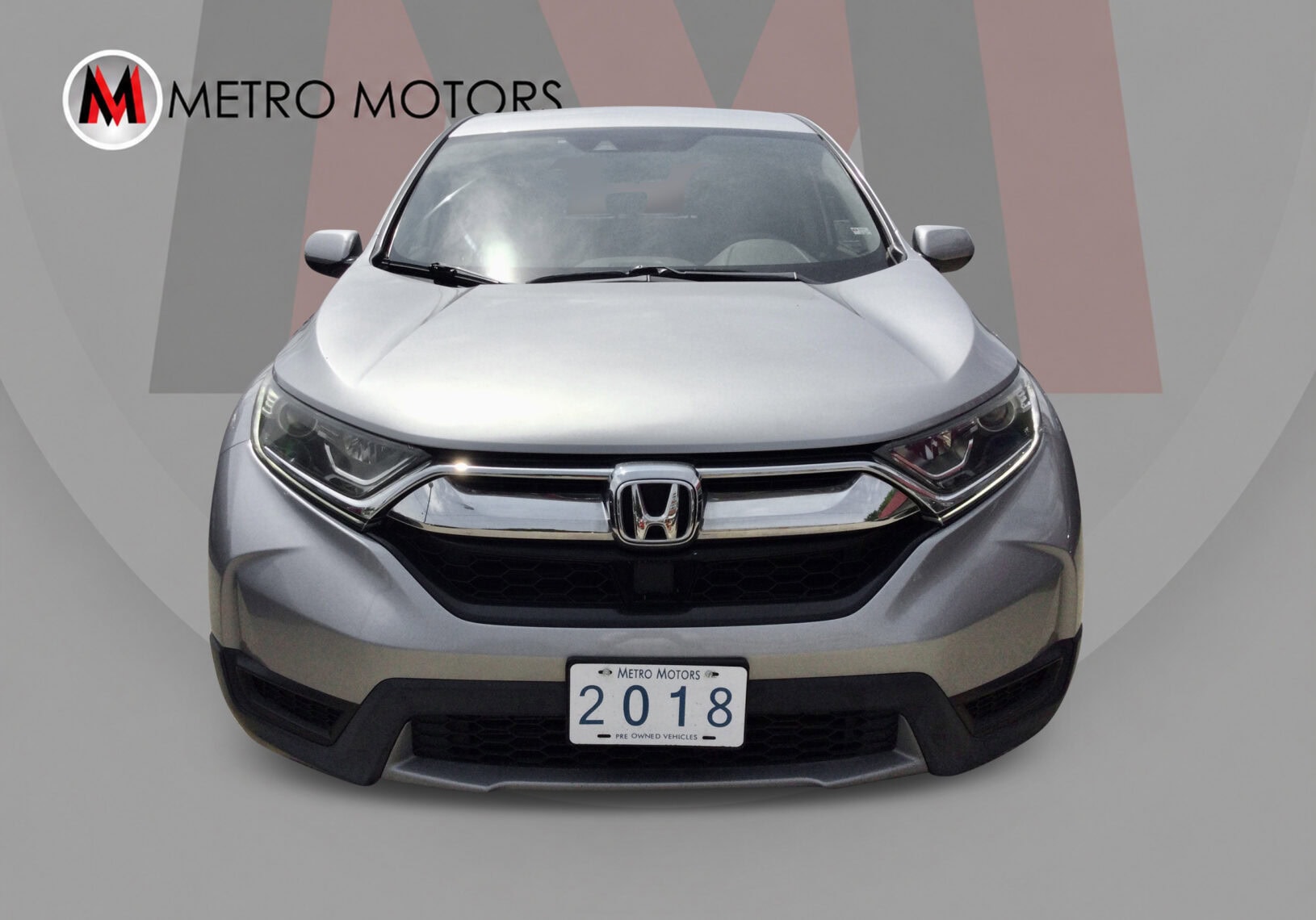 2018 Honda CR-V LX with alloy wheels and rear camera.